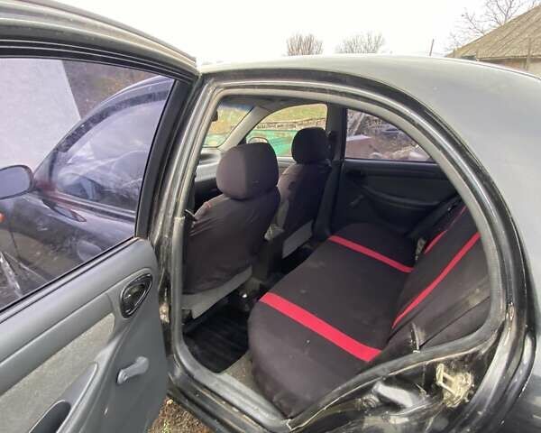 Черный Шевроле Ланос, объемом двигателя 1.5 л и пробегом 200 тыс. км за 2800 $, фото 9 на Automoto.ua