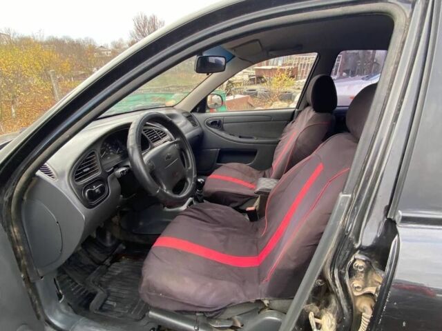 Черный Шевроле Ланос, объемом двигателя 1.5 л и пробегом 200 тыс. км за 2800 $, фото 10 на Automoto.ua