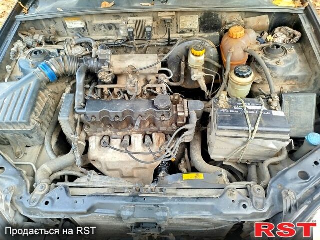 Черный Шевроле Ланос, объемом двигателя 1.5 л и пробегом 480 тыс. км за 1500 $, фото 3 на Automoto.ua