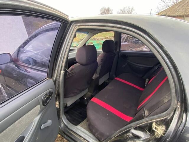 Черный Шевроле Ланос, объемом двигателя 1.5 л и пробегом 200 тыс. км за 2800 $, фото 12 на Automoto.ua