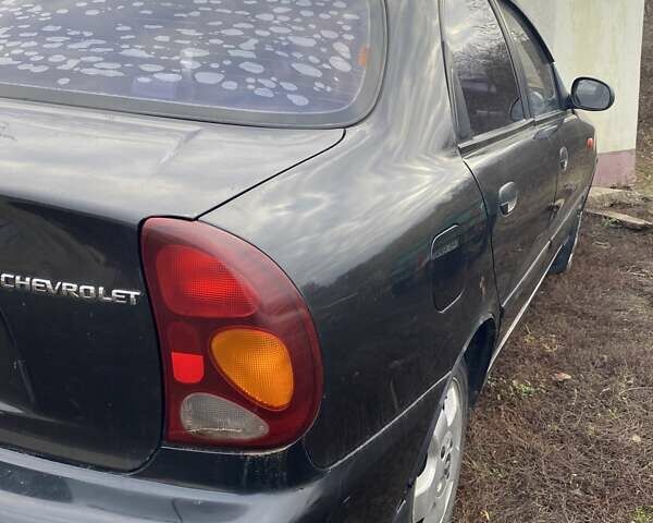 Черный Шевроле Ланос, объемом двигателя 1.5 л и пробегом 200 тыс. км за 2800 $, фото 1 на Automoto.ua