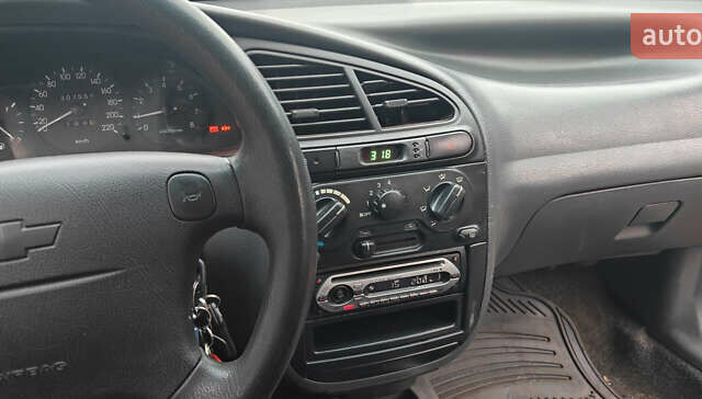 Красный Шевроле Ланос, объемом двигателя 1.5 л и пробегом 307 тыс. км за 2700 $, фото 4 на Automoto.ua