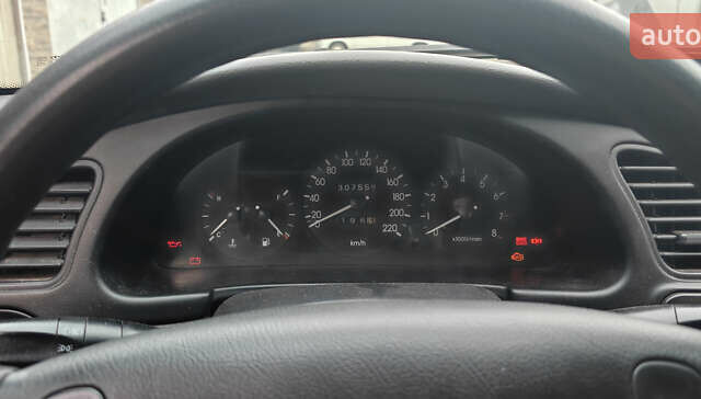 Красный Шевроле Ланос, объемом двигателя 1.5 л и пробегом 307 тыс. км за 2700 $, фото 7 на Automoto.ua