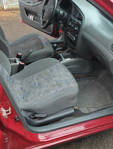 Красный Шевроле Ланос, объемом двигателя 1.5 л и пробегом 307 тыс. км за 2700 $, фото 10 на Automoto.ua