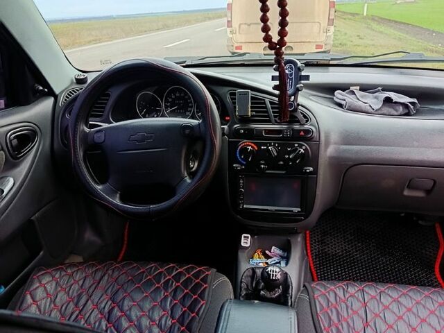 Червоний Шевроле Ланос, об'ємом двигуна 1.5 л та пробігом 221 тис. км за 3000 $, фото 8 на Automoto.ua