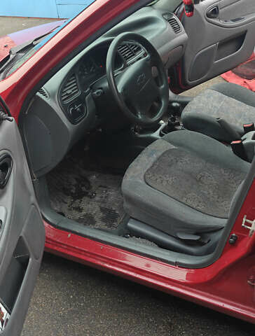 Красный Шевроле Ланос, объемом двигателя 1.5 л и пробегом 307 тыс. км за 2700 $, фото 8 на Automoto.ua