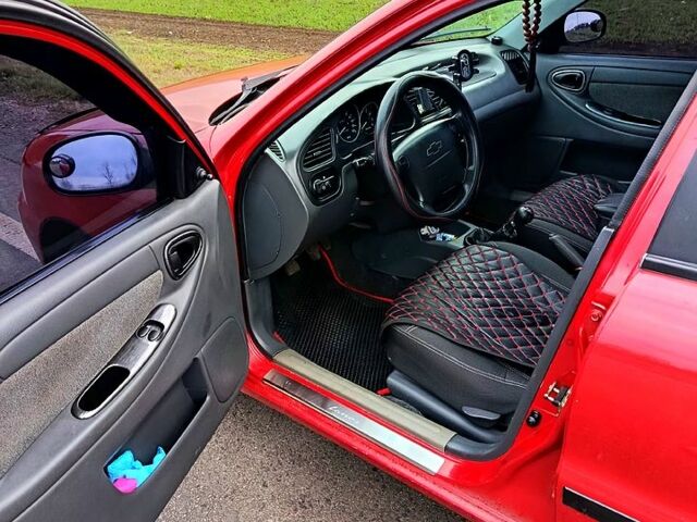 Червоний Шевроле Ланос, об'ємом двигуна 1.5 л та пробігом 221 тис. км за 3000 $, фото 9 на Automoto.ua