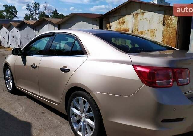 Бежевый Шевроле Малибу, объемом двигателя 2.4 л и пробегом 83 тыс. км за 12500 $, фото 5 на Automoto.ua