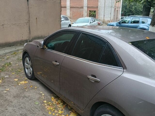 Коричневый Шевроле Малибу, объемом двигателя 2.4 л и пробегом 290 тыс. км за 9000 $, фото 1 на Automoto.ua