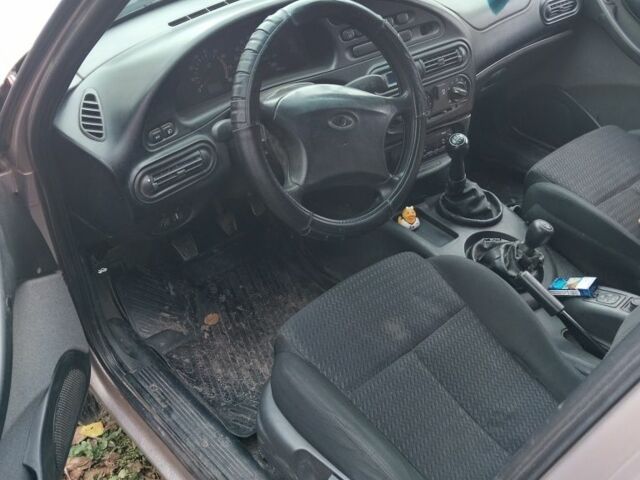 Бежевый Шевроле Нива, объемом двигателя 1.7 л и пробегом 444 тыс. км за 2700 $, фото 4 на Automoto.ua