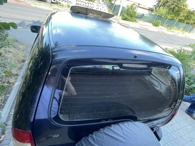 Черный Шевроле Нива, объемом двигателя 1.7 л и пробегом 250 тыс. км за 3800 $, фото 3 на Automoto.ua