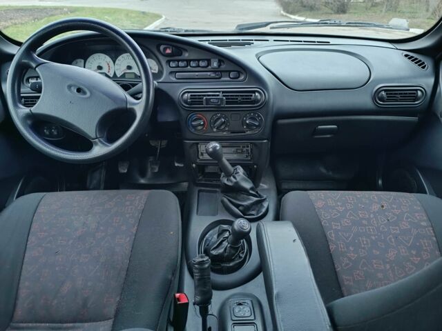 Черный Шевроле Нива, объемом двигателя 1.7 л и пробегом 195 тыс. км за 3100 $, фото 12 на Automoto.ua