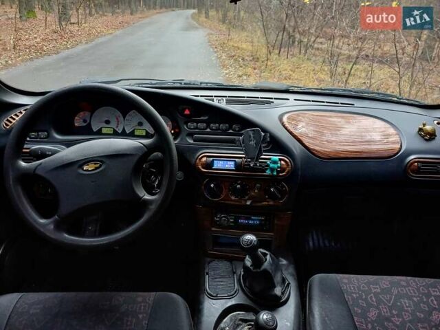 Чорний Шевроле Нива, об'ємом двигуна 1.7 л та пробігом 250 тис. км за 4600 $, фото 5 на Automoto.ua