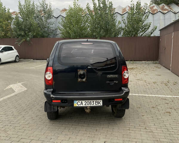 Черный Шевроле Нива, объемом двигателя 1.69 л и пробегом 370 тыс. км за 2800 $, фото 1 на Automoto.ua