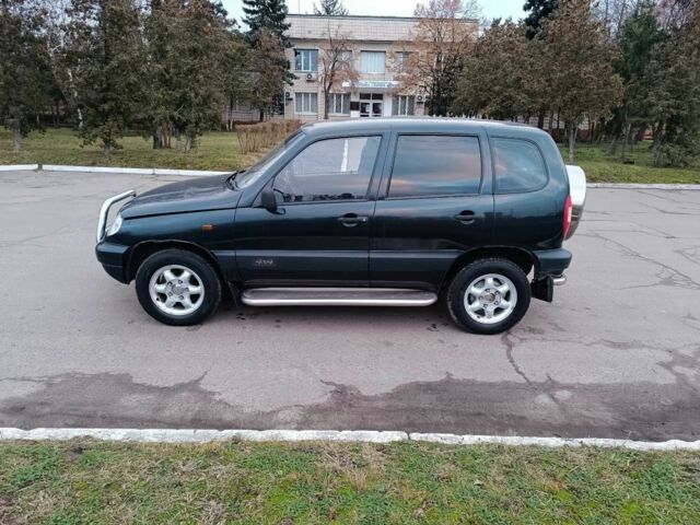 Черный Шевроле Нива, объемом двигателя 1.7 л и пробегом 195 тыс. км за 3100 $, фото 6 на Automoto.ua