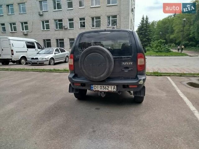 Черный Шевроле Нива, объемом двигателя 1.69 л и пробегом 260 тыс. км за 3800 $, фото 2 на Automoto.ua