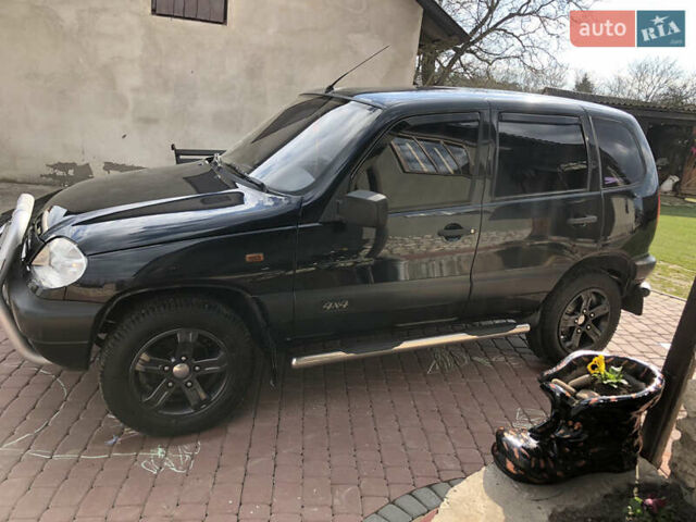 Черный Шевроле Нива, объемом двигателя 1.7 л и пробегом 158 тыс. км за 5200 $, фото 36 на Automoto.ua