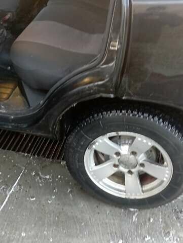 Черный Шевроле Нива, объемом двигателя 1.69 л и пробегом 189 тыс. км за 3500 $, фото 4 на Automoto.ua