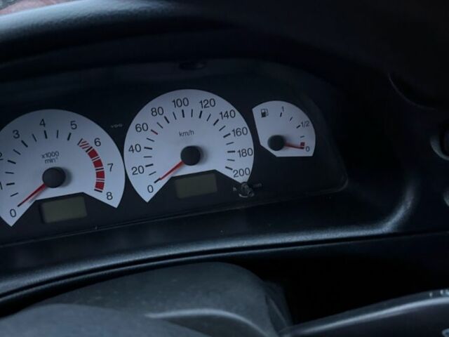 Черный Шевроле Нива, объемом двигателя 1.7 л и пробегом 200 тыс. км за 1307 $, фото 5 на Automoto.ua