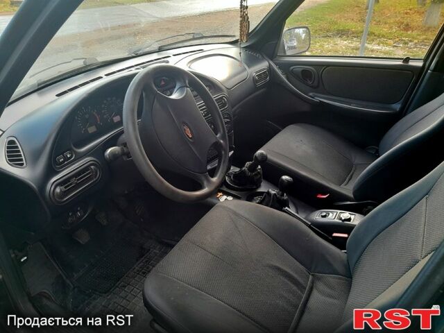 Черный Шевроле Нива, объемом двигателя 1.7 л и пробегом 160 тыс. км за 2999 $, фото 5 на Automoto.ua