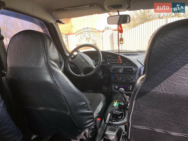 Черный Шевроле Нива, объемом двигателя 1.7 л и пробегом 158 тыс. км за 5200 $, фото 40 на Automoto.ua
