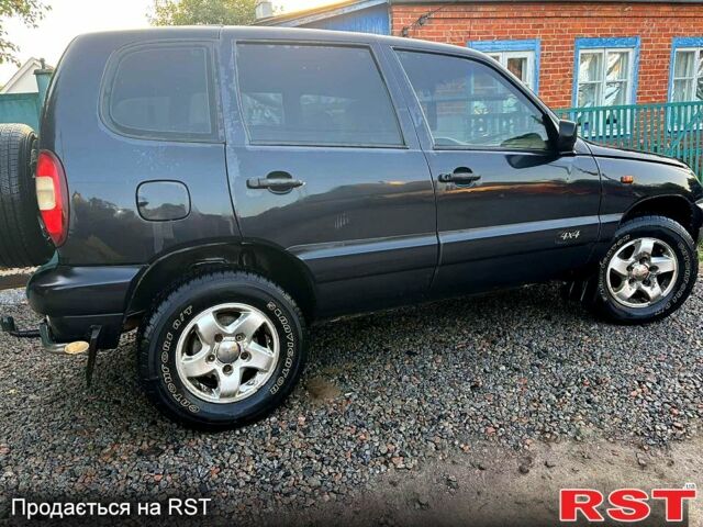 Черный Шевроле Нива, объемом двигателя 1.7 л и пробегом 194 тыс. км за 4100 $, фото 3 на Automoto.ua