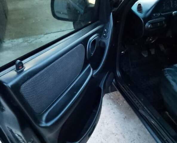 Черный Шевроле Нива, объемом двигателя 1.69 л и пробегом 180 тыс. км за 3300 $, фото 10 на Automoto.ua