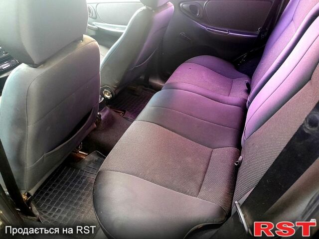 Черный Шевроле Нива, объемом двигателя 1.7 л и пробегом 160 тыс. км за 2999 $, фото 6 на Automoto.ua