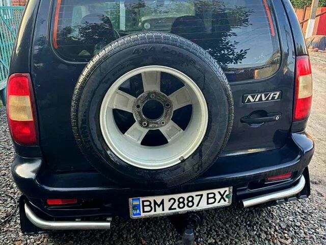 Черный Шевроле Нива, объемом двигателя 1.7 л и пробегом 194 тыс. км за 4100 $, фото 5 на Automoto.ua