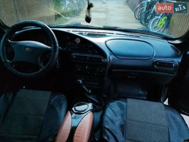 Черный Шевроле Нива, объемом двигателя 1.69 л и пробегом 180 тыс. км за 3300 $, фото 11 на Automoto.ua
