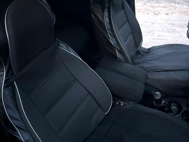 Черный Шевроле Нива, объемом двигателя 1.7 л и пробегом 194 тыс. км за 4100 $, фото 7 на Automoto.ua