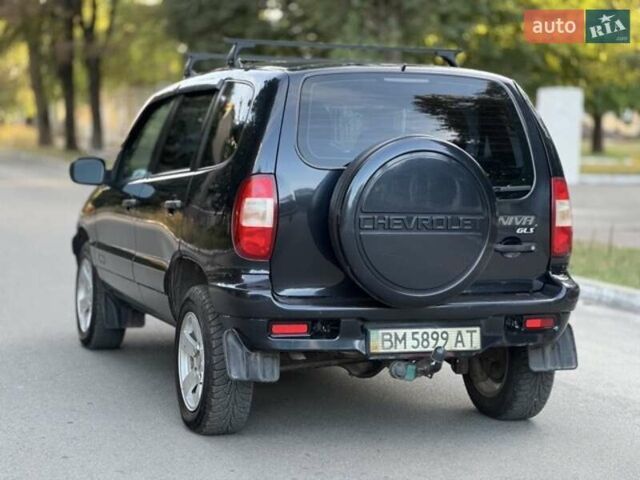 Черный Шевроле Нива, объемом двигателя 1.69 л и пробегом 63 тыс. км за 5500 $, фото 5 на Automoto.ua