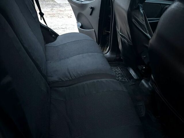 Черный Шевроле Нива, объемом двигателя 1.7 л и пробегом 194 тыс. км за 4100 $, фото 10 на Automoto.ua