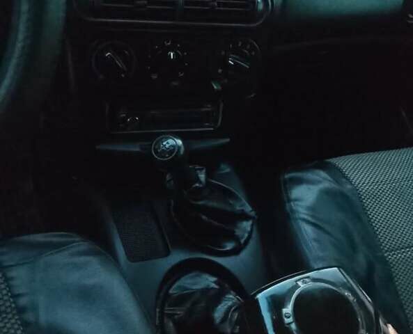 Черный Шевроле Нива, объемом двигателя 1.69 л и пробегом 180 тыс. км за 3300 $, фото 13 на Automoto.ua