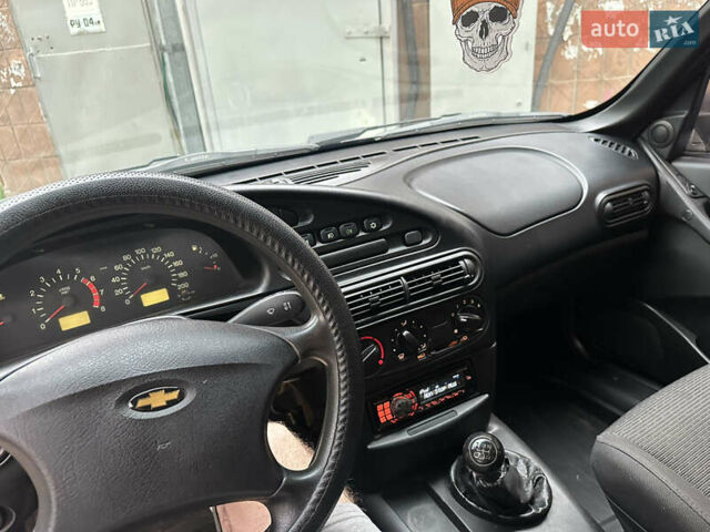 Черный Шевроле Нива, объемом двигателя 1.69 л и пробегом 264 тыс. км за 3700 $, фото 13 на Automoto.ua