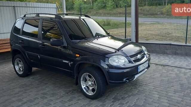 Черный Шевроле Нива, объемом двигателя 1.7 л и пробегом 111 тыс. км за 5700 $, фото 5 на Automoto.ua