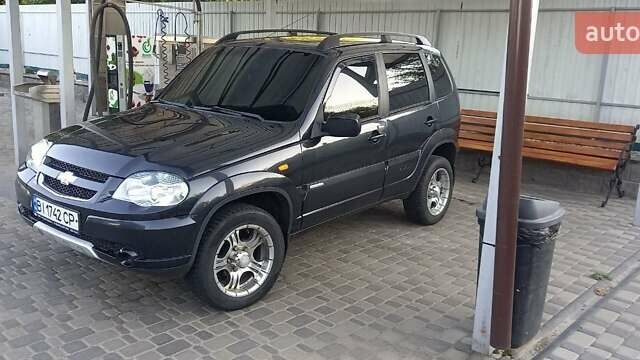 Черный Шевроле Нива, объемом двигателя 1.7 л и пробегом 111 тыс. км за 5700 $, фото 3 на Automoto.ua