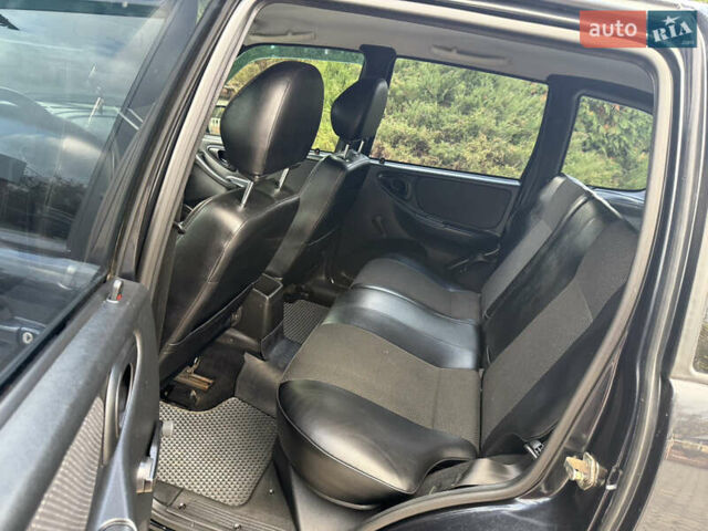 Шевроле Нива 2010 у Вінниці на Automoto.ua Чорний Шевроле Нива, об'ємом двигуна 1.7 л та пробігом 50 тис. км за 6850 $, фото 49 на Automoto.ua