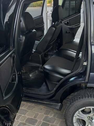 Черный Шевроле Нива, объемом двигателя 1.7 л и пробегом 111 тыс. км за 5700 $, фото 7 на Automoto.ua