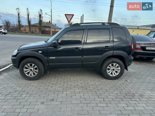 Черный Шевроле Нива, объемом двигателя 1.69 л и пробегом 118 тыс. км за 7500 $, фото 3 на Automoto.ua