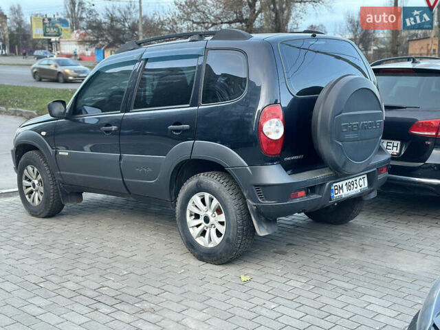 Черный Шевроле Нива, объемом двигателя 1.69 л и пробегом 118 тыс. км за 7500 $, фото 4 на Automoto.ua