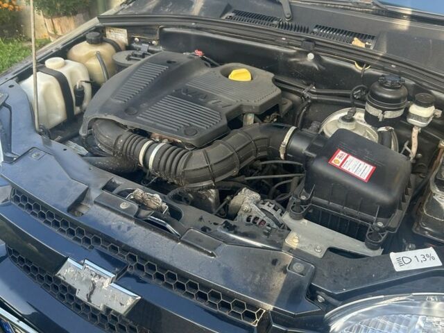 Чорний Шевроле Нива, об'ємом двигуна 1.7 л та пробігом 125 тис. км за 7000 $, фото 4 на Automoto.ua