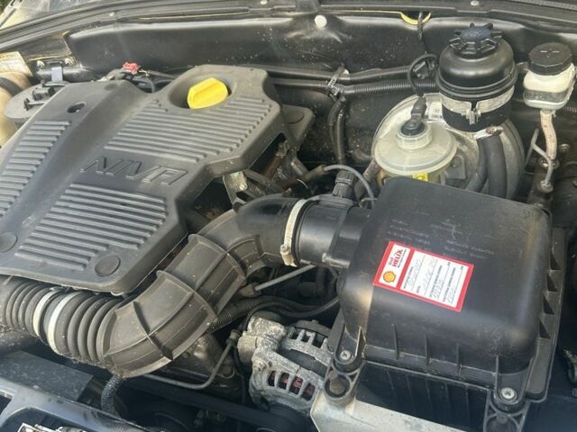 Чорний Шевроле Нива, об'ємом двигуна 1.7 л та пробігом 125 тис. км за 7000 $, фото 5 на Automoto.ua