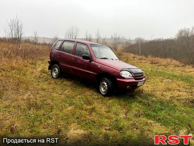 Красный Шевроле Нива, объемом двигателя 1.7 л и пробегом 250 тыс. км за 3300 $, фото 2 на Automoto.ua