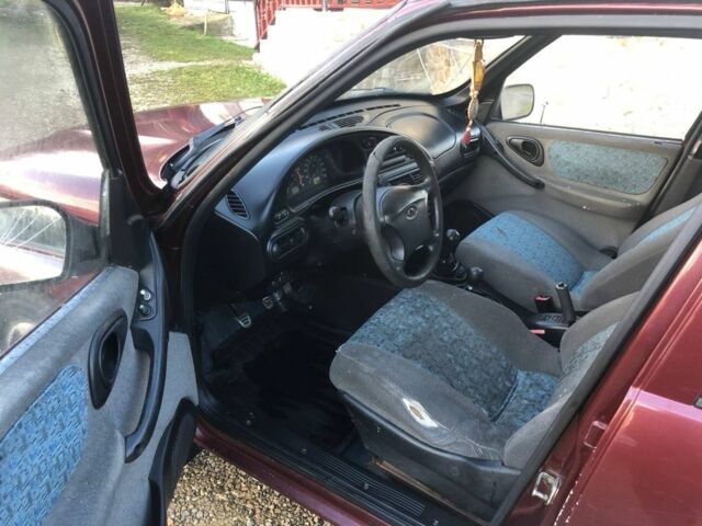 Красный Шевроле Нива, объемом двигателя 1.7 л и пробегом 280 тыс. км за 2350 $, фото 14 на Automoto.ua