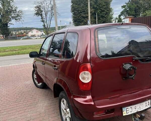 Красный Шевроле Нива, объемом двигателя 1.7 л и пробегом 222 тыс. км за 2999 $, фото 7 на Automoto.ua