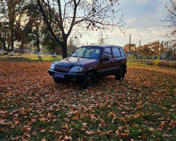 Червоний Шевроле Нива, об'ємом двигуна 1.7 л та пробігом 301 тис. км за 2950 $, фото 2 на Automoto.ua
