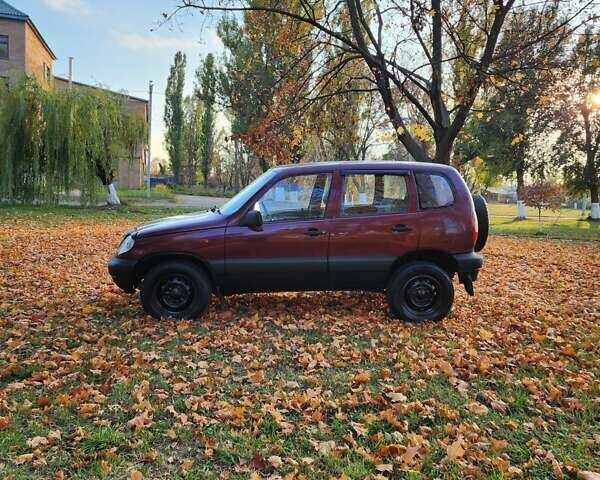 Червоний Шевроле Нива, об'ємом двигуна 1.7 л та пробігом 301 тис. км за 2950 $, фото 5 на Automoto.ua