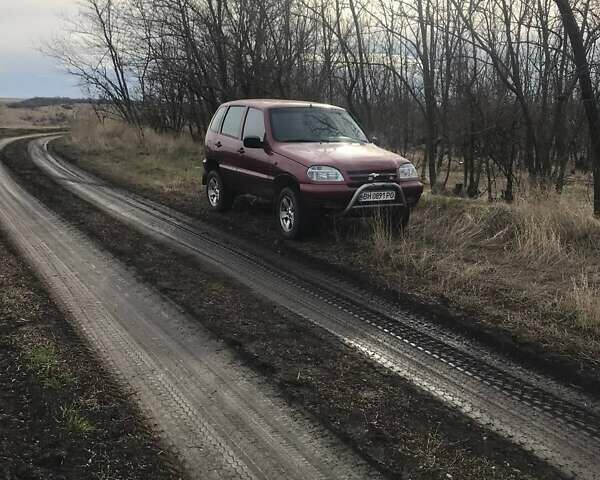 Червоний Шевроле Нива, об'ємом двигуна 1.7 л та пробігом 180 тис. км за 4800 $, фото 15 на Automoto.ua