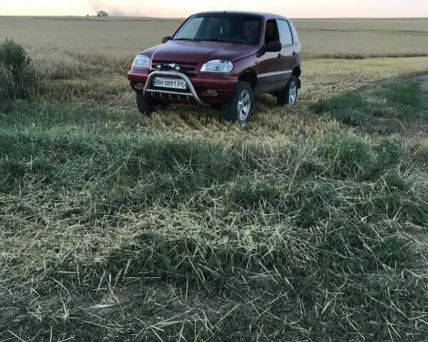 Червоний Шевроле Нива, об'ємом двигуна 1.7 л та пробігом 180 тис. км за 4800 $, фото 14 на Automoto.ua